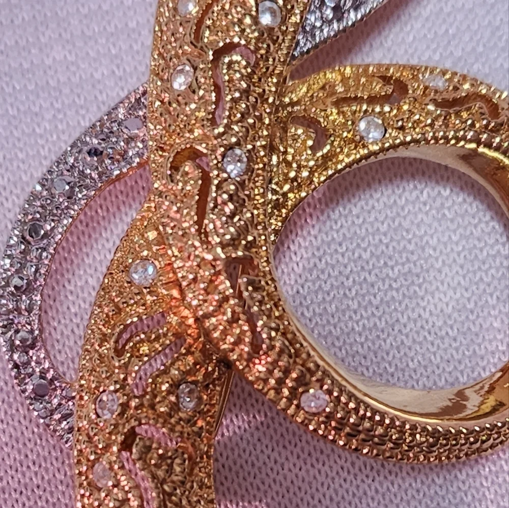 Avon Silver and Gold Tone Swirl Brooch with Rhinestones